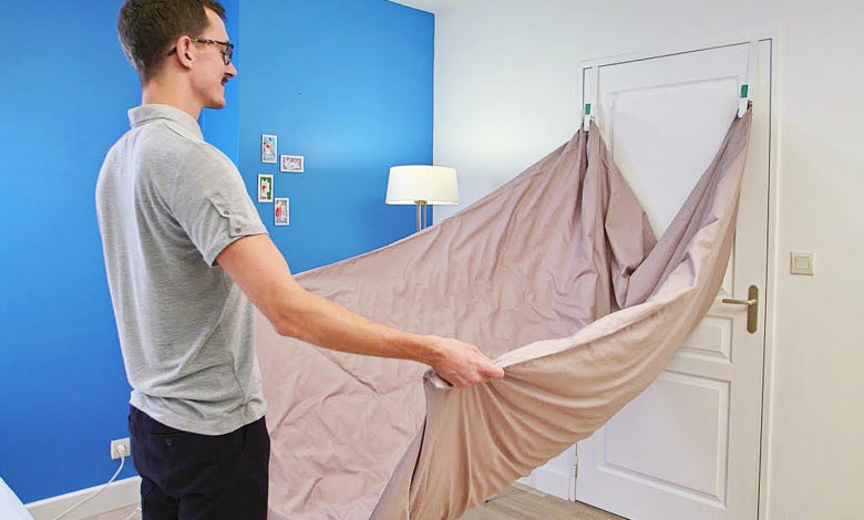HOPOLI, un ingénieux système pour enfiler une housse de couette les doigts dans le nez