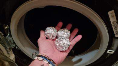 trois boules d'aluminium dans un lave linge
