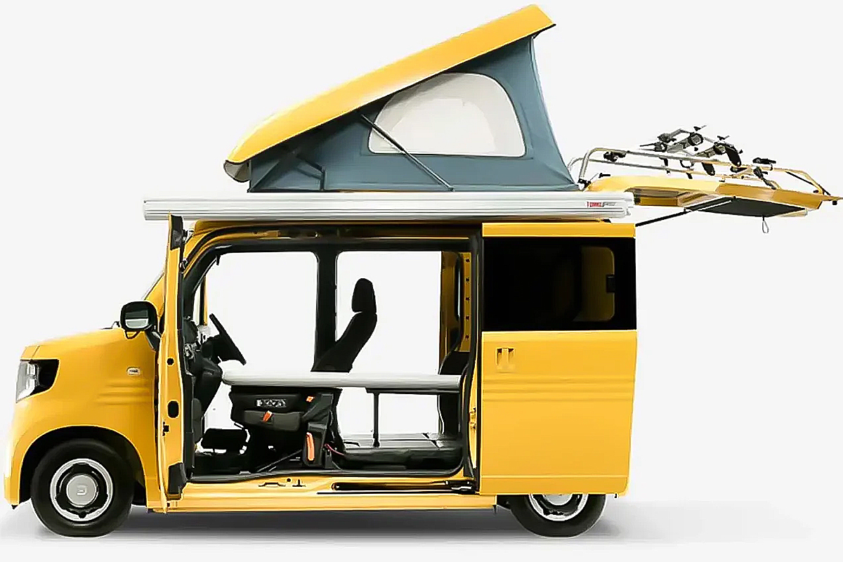 un camping car jaune de coté