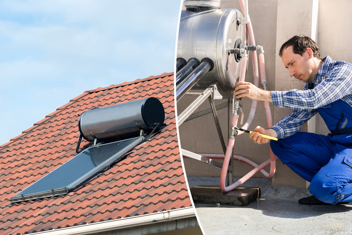 Un homme installe un chauffe eau solaire