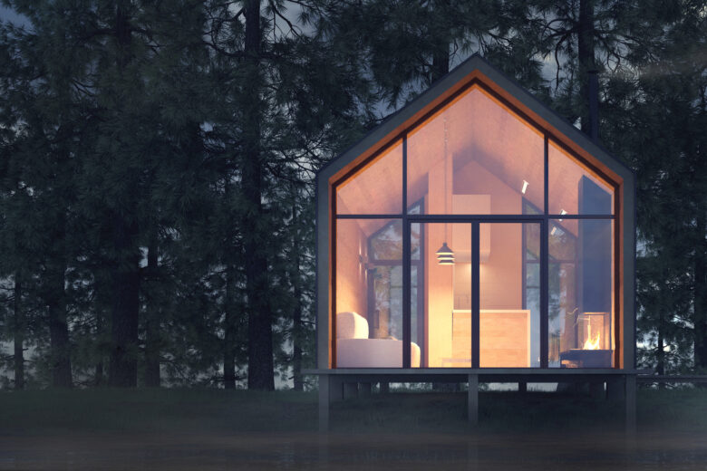 Une maison en bois de nuit