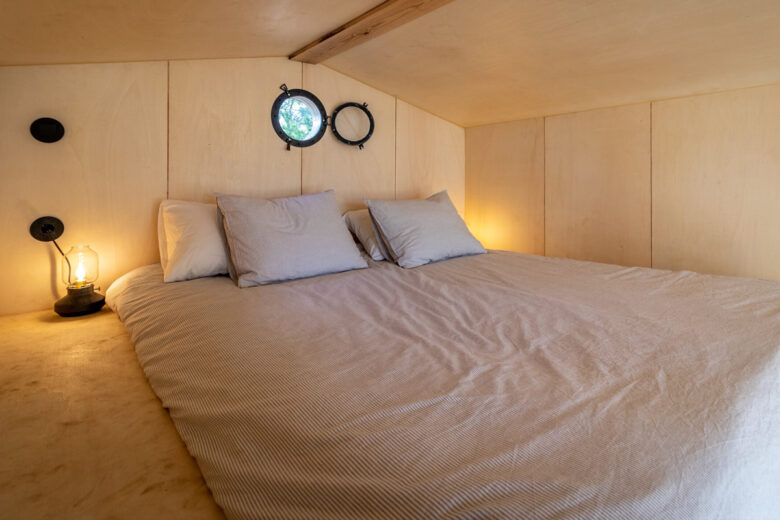 Wooden tiny house bedroom