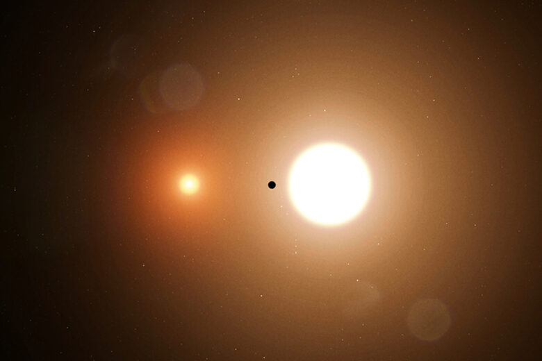 TOI 1338 b est silhouetté par ses étoiles hôtes. TESS ne détecte que les transits de la plus grande étoile.
