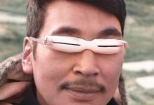 Lunettes de protection des inuits fabriqués à partir de bois de caribous , le tendon pour sangle
