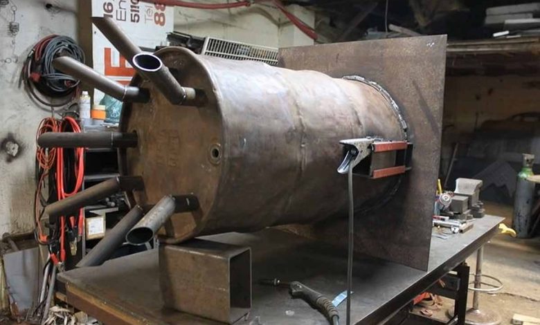La fabrication d'un poêle Dragon convecteur Rocket Stove pour chauffer une maison.