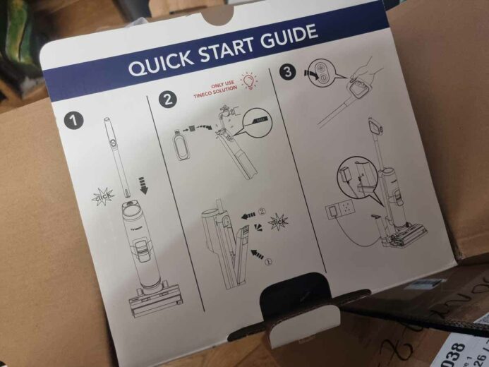 Le guide de démarrage rapide sur le carton.