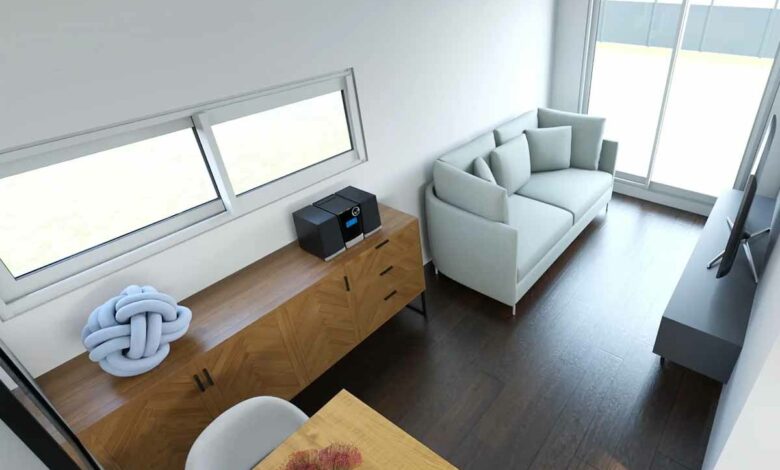 La maison container dispose d'une chambre et d'une salle de bains.