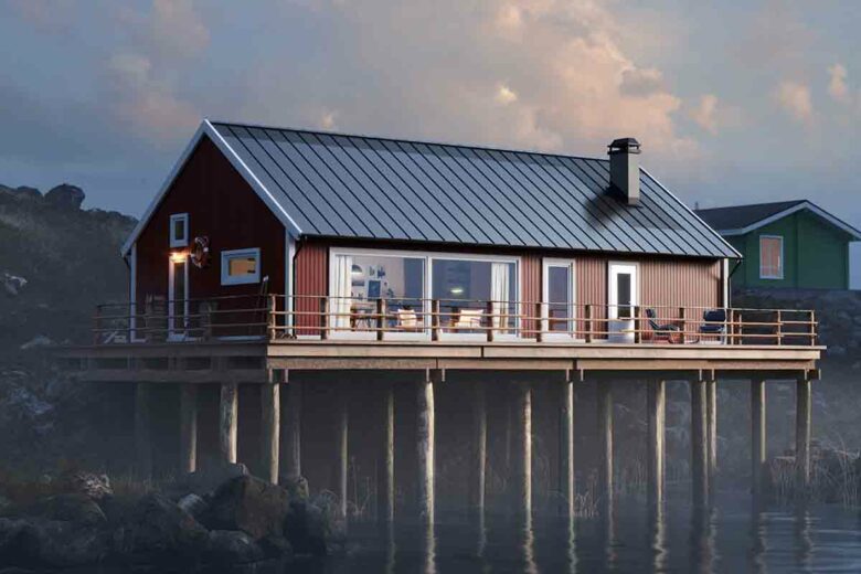 Une toiture complète en panneaux photovoltaïques donne un aspect nordique à cette maison sur pilotis.