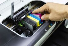 Comment faire pour que l'imprimante reconnaisse les cartouches ?