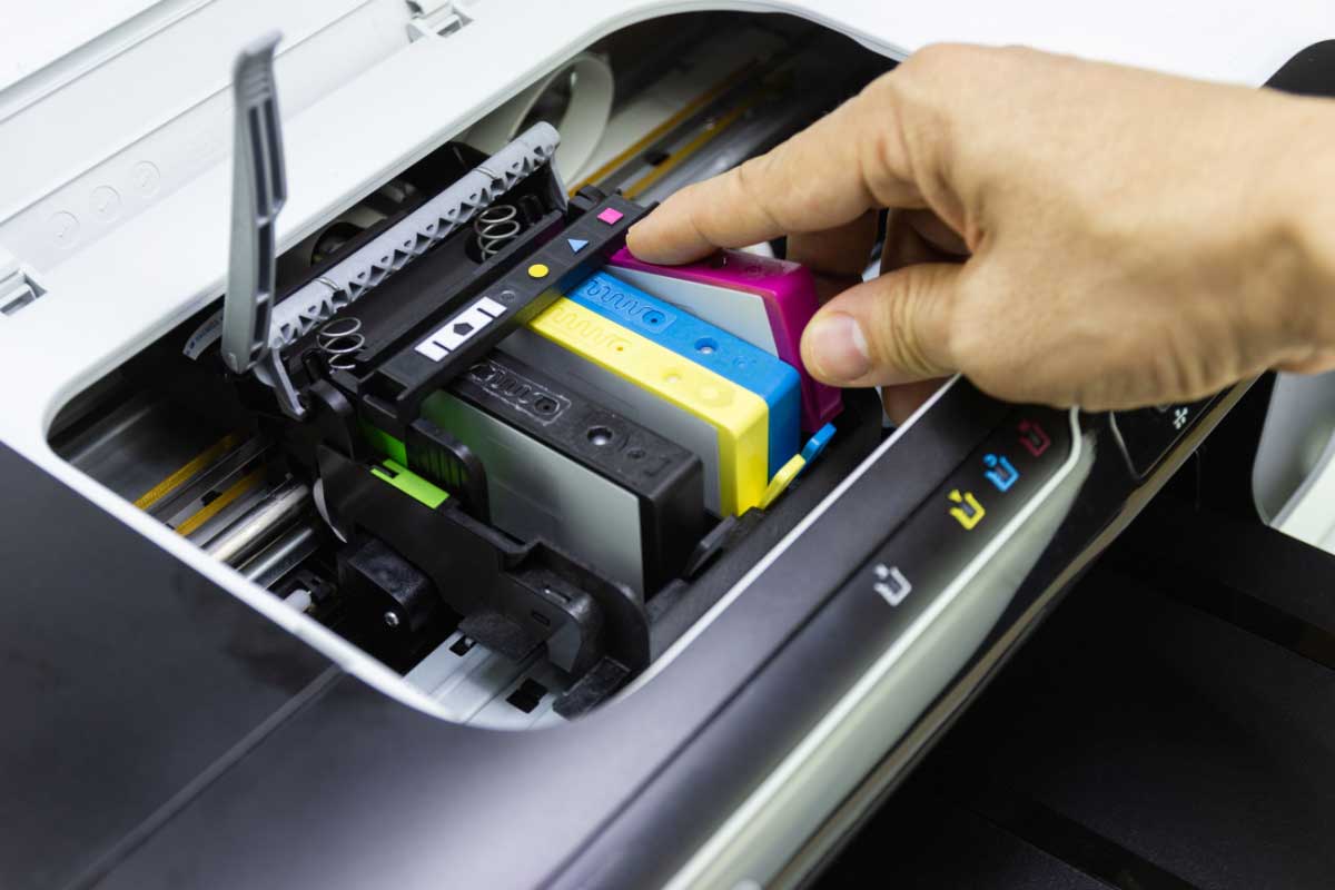 Comment faire pour que l'imprimante reconnaisse les cartouches ?