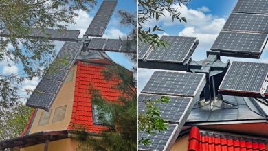 Un moulin à vent transformé avec des panneaux solaires sert désormais de maison de vacances.