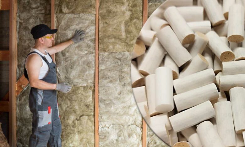 Ouvrier réalisant l'isolation d'un mur.
