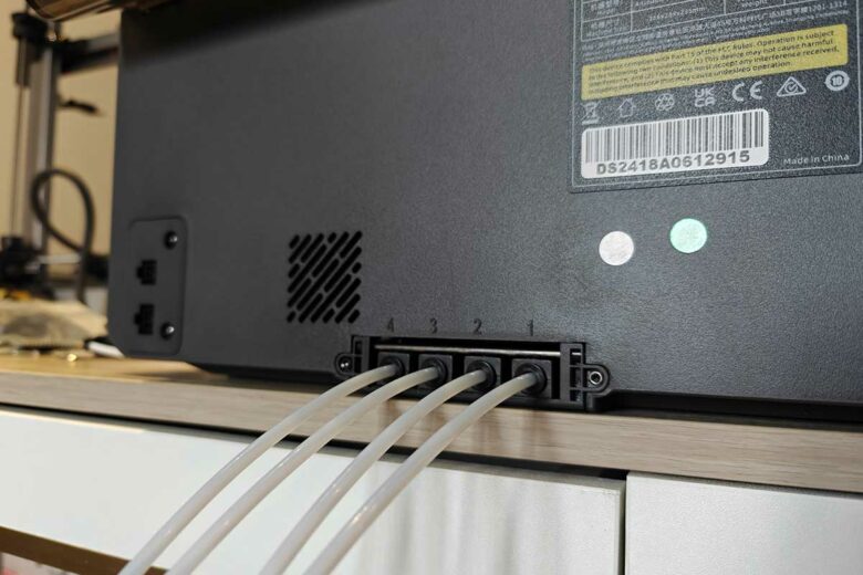 Le jumelage du chargeur à l'imprimante 3D.