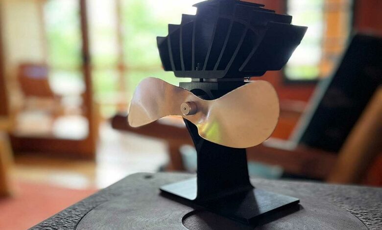 Un ventilateur qui se place sur le poêle.