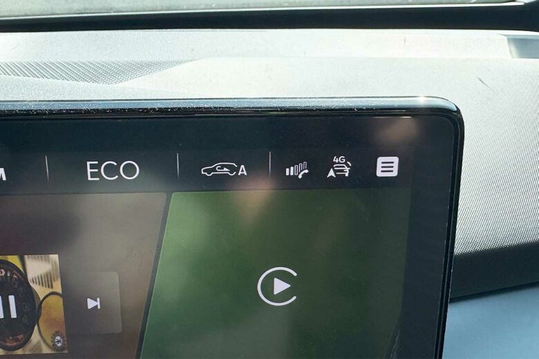 Le bouton de recirculation d'air.