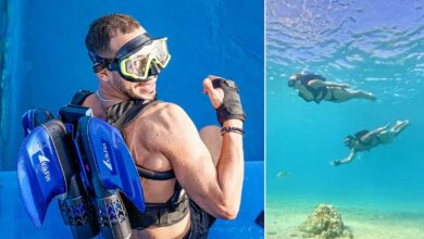 Un nageur équipé du jetpack Shark de KikFin.
