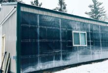 Une façade d'atelier en mur-trombe.